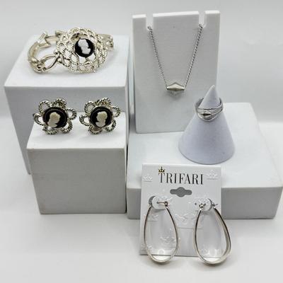 LOT 119: Trifari Earrings, Cameo Earrings & Matching Bracelet & More