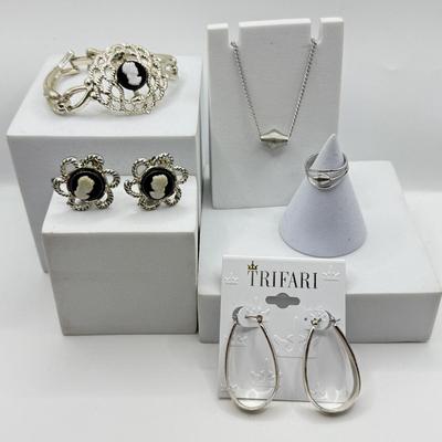 LOT 119: Trifari Earrings, Cameo Earrings & Matching Bracelet & More