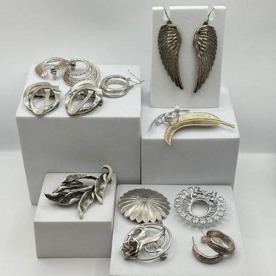 LOT 120: Collection of Silvertone Jewelry: Earrings & Brooches