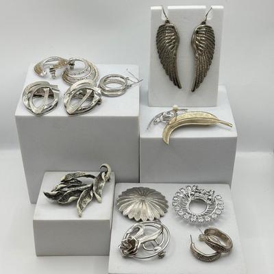 LOT 120: Collection of Silvertone Jewelry: Earrings & Brooches