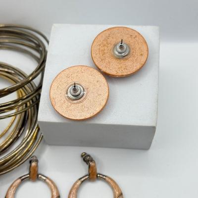 LOT 181: Collection of Bangle Bracelets & Earrings