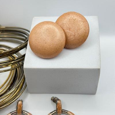 LOT 181: Collection of Bangle Bracelets & Earrings