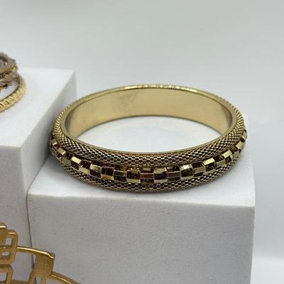LOT 183: Collection of Goldtone Bracelets