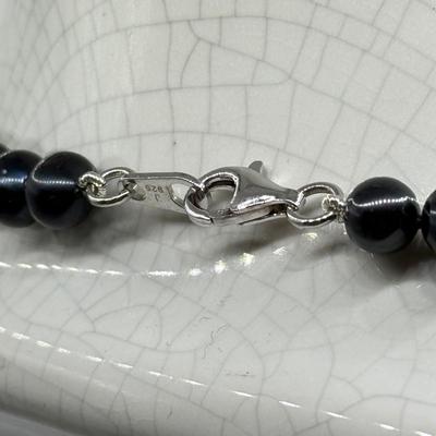 LOT 187: 17” Black Pearl Necklace