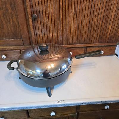 Vintage Dominion Electric waffle iron and a Circulon electric skillet