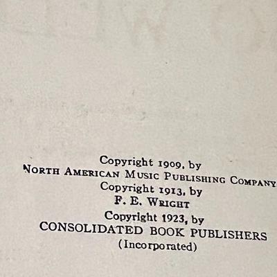 Sale Photo Thumbnail #6: Antique 1923 edition of The Old Songs We Love So Well, a compilation of seven classic songbooks in one volume, including selections from domestic, national, college, operatic, home, and sacred traditions. Bound in red cloth with gilt illustrations and let