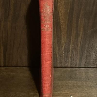 Sale Photo Thumbnail #5: Antique 1923 edition of The Old Songs We Love So Well, a compilation of seven classic songbooks in one volume, including selections from domestic, national, college, operatic, home, and sacred traditions. Bound in red cloth with gilt illustrations and let