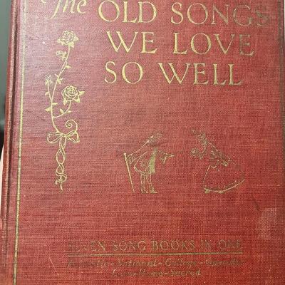 Sale Photo Thumbnail #7: Antique 1923 edition of The Old Songs We Love So Well, a compilation of seven classic songbooks in one volume, including selections from domestic, national, college, operatic, home, and sacred traditions. Bound in red cloth with gilt illustrations and let