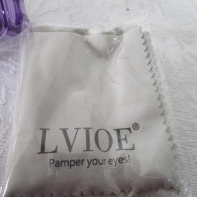New in box Lvioe sunglasses with lens cleaning cloth