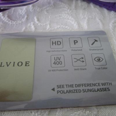 New in box Lvioe sunglasses with lens cleaning cloth