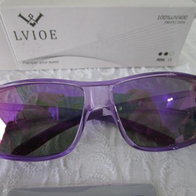 New in box Lvioe sunglasses with lens cleaning cloth