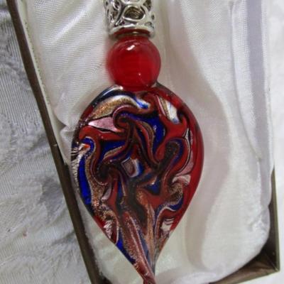 New in box magnifying glass with blown glass handle