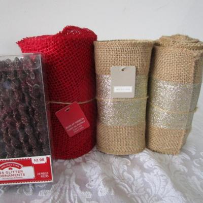 3 new rolls of burlap ribbon, 1 new pkg icicle ornaments