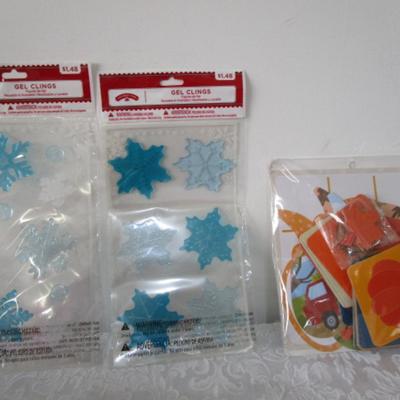 1 pkg Thanksgiving decoration kit and 2 pkgs Snowflake gel clings