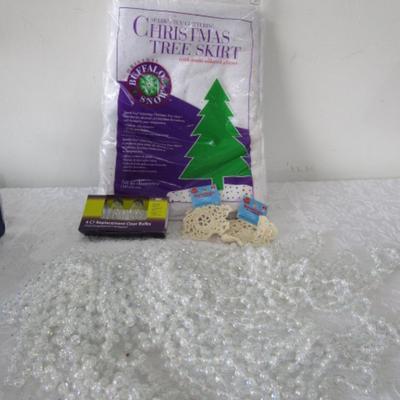 7 strings of beads, 2 crocheted snowflakes, pkg 3 bulbs, Tree skirt