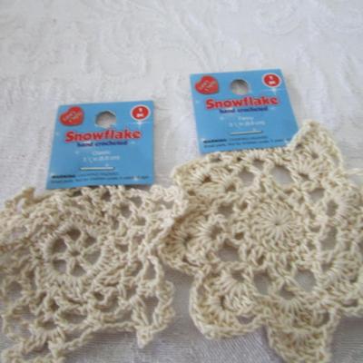 7 strings of beads, 2 crocheted snowflakes, pkg 3 bulbs, Tree skirt