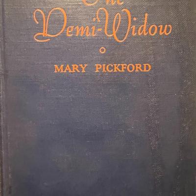 Sale Photo Thumbnail #26: Original 1935 edition of The Demi-Widow by Mary Pickford, published by The Pickford Corporation. Mary Pickford—“America’s Sweetheart”—was one of the most important figures in early Hollywood: actress, producer, and co-founder of United Artists.

