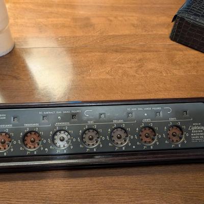 Antique adding machine