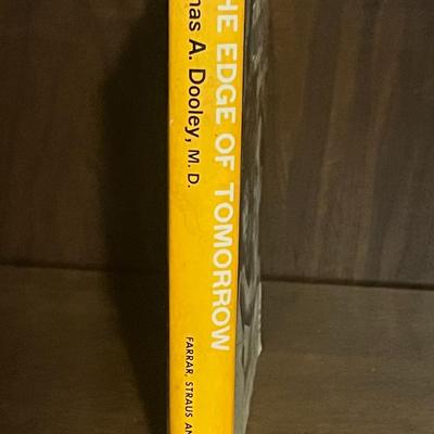 Sale Photo Thumbnail #54: Vintage 1958 hardcover first edition of The Edge of Tomorrow by Thomas A. Dooley, M.D., published by Farrar, Straus and Cudahy. Includes the original dust jacket (shows noticeable wear and edge tears). Book itself is clean and intact. Dr. Tom Dooley was a