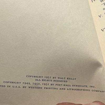 Sale Photo Thumbnail #58: Vintage 1951 POGO comic paperback by Walt Kelly. Early printing with classic artwork. Shows heavy cover wear and paper loss (see photos) but complete and readable. Great filler copy for collectors of early cartoon or comic strip books.