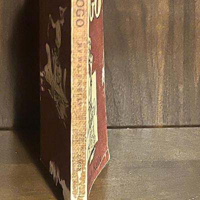 Sale Photo Thumbnail #59: Vintage 1951 POGO comic paperback by Walt Kelly. Early printing with classic artwork. Shows heavy cover wear and paper loss (see photos) but complete and readable. Great filler copy for collectors of early cartoon or comic strip books.