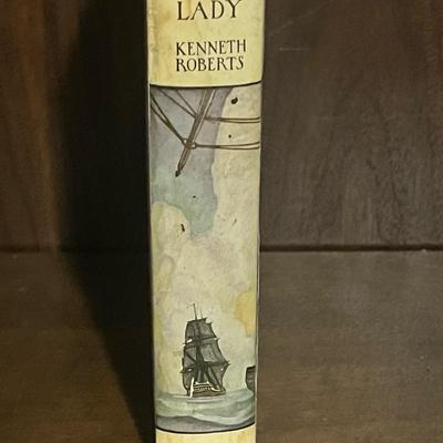 Sale Photo Thumbnail #61: Original 1931 First Edition of The Lively Lady by Kenneth Roberts, published by Doubleday, Doran. Includes original dust jacket featuring vibrant period artwork. Jacket shows edge wear, creasing, and small tears; book interior is clean with illustrated ma