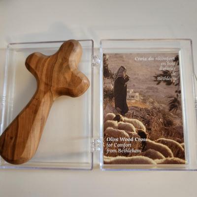 Sale Photo Thumbnail #399: This auction lot is for Three Crucifix. These handsome renditions speak volumes to those who seek. One is a quite artistic and pearlized cross, another is of Holy Land Olive Wood and the other is a nice polished wood cross.