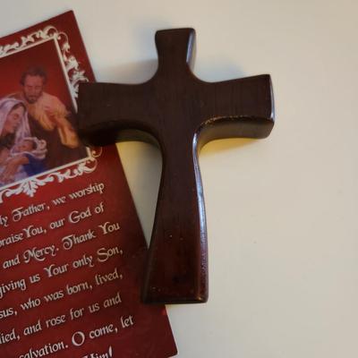 Sale Photo Thumbnail #401: This auction lot is for Three Crucifix. These handsome renditions speak volumes to those who seek. One is a quite artistic and pearlized cross, another is of Holy Land Olive Wood and the other is a nice polished wood cross.