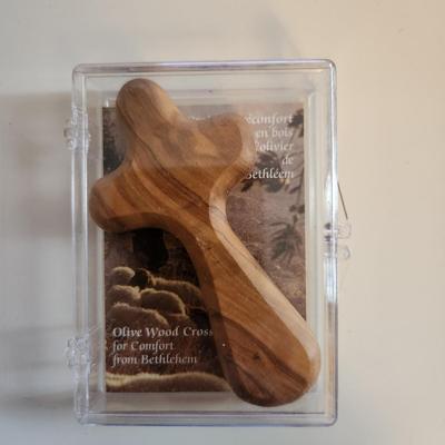 Sale Photo Thumbnail #398: This auction lot is for Three Crucifix. These handsome renditions speak volumes to those who seek. One is a quite artistic and pearlized cross, another is of Holy Land Olive Wood and the other is a nice polished wood cross.