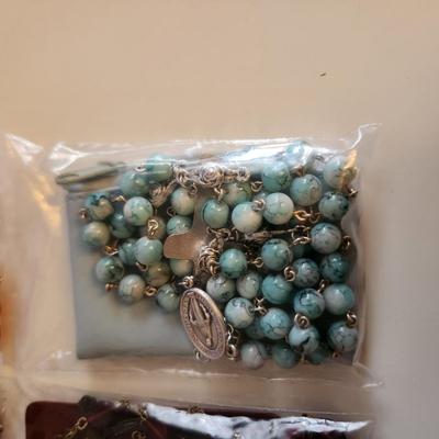 Sale Photo Thumbnail #410: This auction lot is for a grouping of Four Rosaries with Cases. These rosaries are quite handsome and useful. Buying the four as a lot.