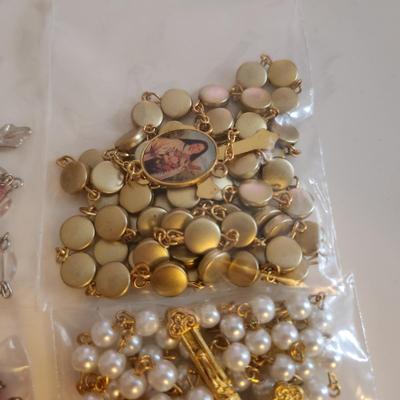 Sale Photo Thumbnail #422: This auction lot is for a grouping of Five Rosaries and Two Chaplets. Quite a nice collection. Ready for personal use or gifting. Buying as a lot.