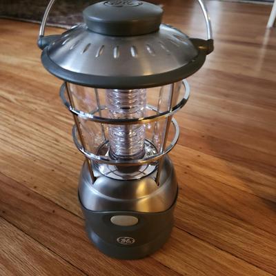 Sale Photo Thumbnail #441: This auction lot is for a GE Emergency/Camping Lantern.  This lantern runs off four D-cell batteries.  Puts out a lot light - useful for camping or when the electric goes out.