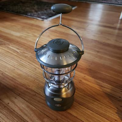 Sale Photo Thumbnail #440: This auction lot is for a GE Emergency/Camping Lantern.  This lantern runs off four D-cell batteries.  Puts out a lot light - useful for camping or when the electric goes out.