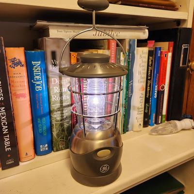 Sale Photo Thumbnail #437: This auction lot is for a GE Emergency/Camping Lantern.  This lantern runs off four D-cell batteries.  Puts out a lot light - useful for camping or when the electric goes out.