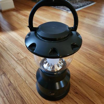 Sale Photo Thumbnail #443: This auction lot is for a Enbrighten Emergency/Camping Lantern.  This lantern run on eight D-cell batteries.  Provides a very bright light that can be dimmed or brighten.