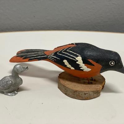 Pewter duck and wood bird