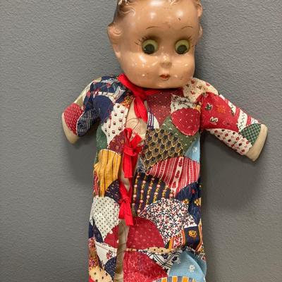 Googley eye doll and Asian doll