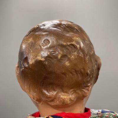 Googley eye doll and Asian doll