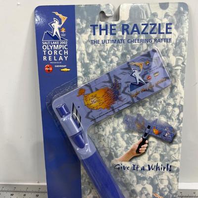 A bit of Olympic Memoribilia:2 Flags, Torch and Rattle 