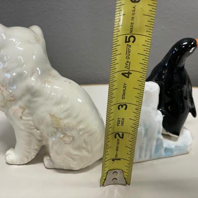 White cat and penguin ceramic