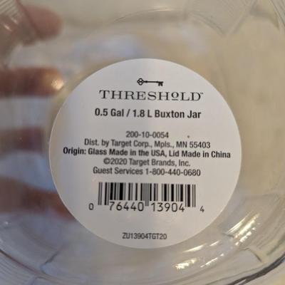 Glass storage jar with wide lid