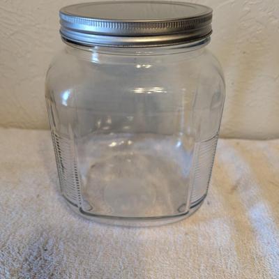 Glass storage jar with wide lid