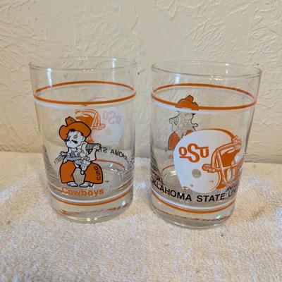 two Oklahoma State University (OSU) Cowboys logo shot or whiskey glasses.