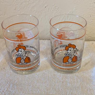 two Oklahoma State University (OSU) Cowboys logo shot or whiskey glasses.