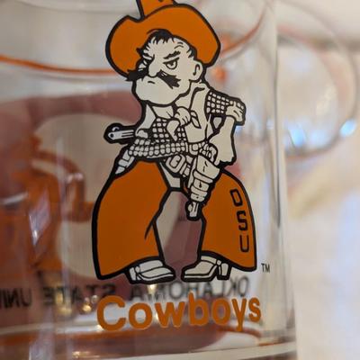 two Oklahoma State University (OSU) Cowboys logo shot or whiskey glasses.