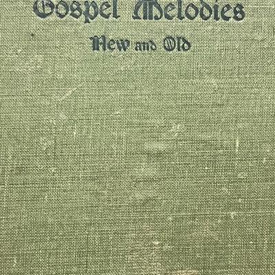 Sale Photo Thumbnail #86: Antique 1904 clothbound hymnal titled Gospel Melodies: New and Old, published by the Universalist Publishing House. Features early 20th-century gospel and worship music, with original price list and classic gothic-style lettering. A charming collectible f
