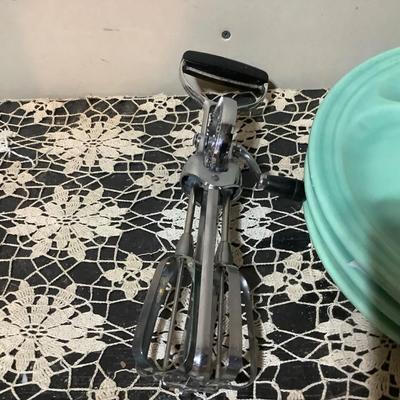 Sale Photo Thumbnail #368: You get 4 divided dinner plates, two hand mashers one red handle the other blue handle.  You also get a black handle hand mixer, and a metal cookie cutter.