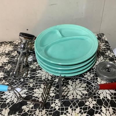 Sale Photo Thumbnail #363: You get 4 divided dinner plates, two hand mashers one red handle the other blue handle.  You also get a black handle hand mixer, and a metal cookie cutter.