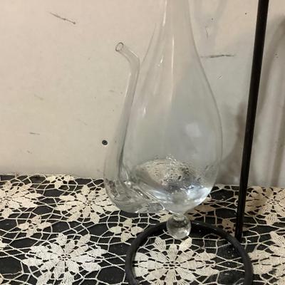 Sale Photo Thumbnail #302: Clear glass hanging teapot.