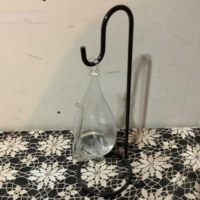 Sale Photo Thumbnail #301: Clear glass hanging teapot.